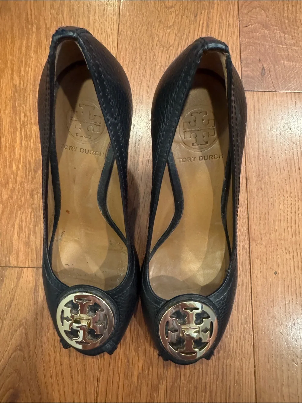 Tory Burch Black Leather Wedge Pumps with Gold Logo